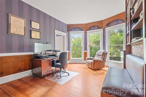 The main-level primary suite includes an ensuite bath and an attached true study.  An expansion of the primary bedroom into the adjoining study is well within the realm of possibility.