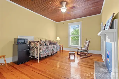 Second floor bedrooms are spacious with hardwood floors, wood bead board ceilings, fireplaces and closets. Bedroom 4 of 5