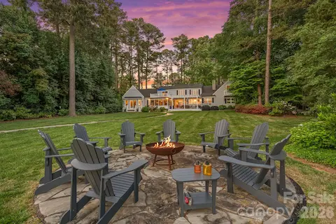 Expansive level backyard with shoreline access