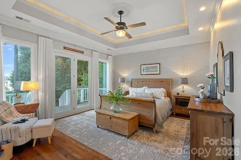 Main level primary filled with peaceful lake views
