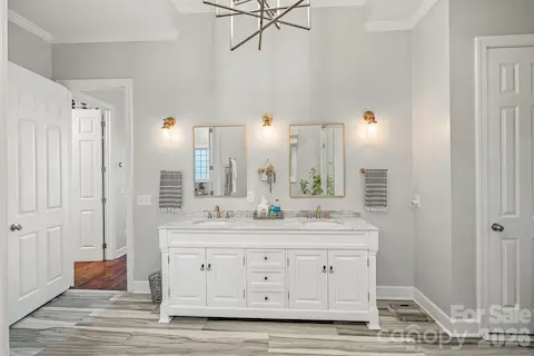 Renovated spa bath with dual vanities