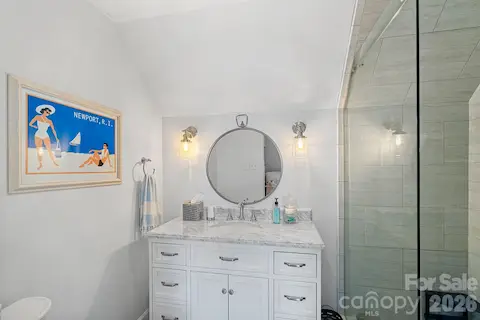 3 full upstairs baths give guests their own spaces