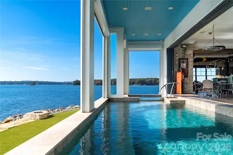 BREATHTAKING VIEW FROM YOUR HEATED INDOOR SALTWATER POOL AND SPA, UNWIND, INDULGE IN YEAR-ROUND "RESORT LIVING" STACKING SLIDER "WALL OF GLASS" DOORS TO SEAMLESSLY MERGE THE OUTDOOR IN