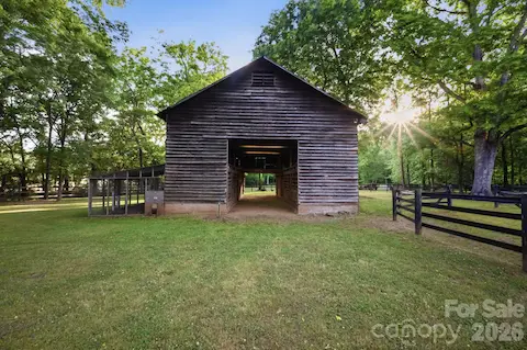 An 8 stall historic barn with an attached chicken coop and hay loft is ideal for your farm animals of choice making this an ideal sustainable hobby farm.