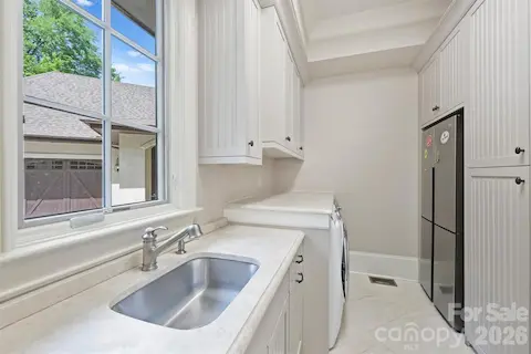 laundry room, extra fridge/freezer/ storage