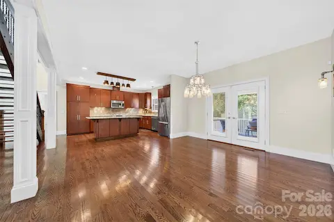 Large eat-in breakfast area, or sitting area with french door access to Screen Porch