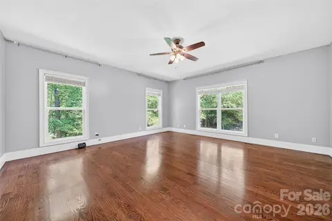 Primary Bedroom on Main level offers privacy & natural light