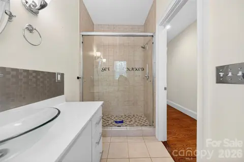 Hall bath with full size walk-in tiled shower