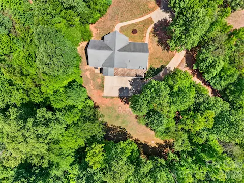 Stunning, completely private property surrounded by mature trees, offering a peaceful and secluded retreat.