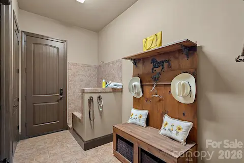 Mudroom with a dog wash station.