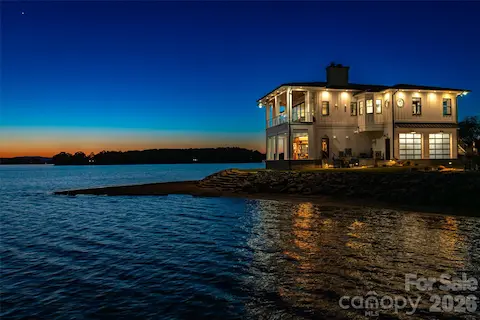 AN UNMATCHED EVENING ELEGANCE OF "FIRE AND ICE" SWEEPING TWILIGHT VISTAS OF THIS PIPPIN HOME DESIGN THAT IS A TRUE IMAGE OF THE CLIENTS DESIRE FOR A DISTINCTIVE HOME REFLECTING PERSONALITY AND ABUNDANT VIEWS