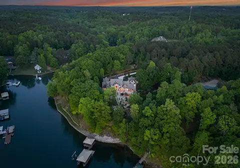 Aerial view of the home featuring stunning views of Lake Norman.