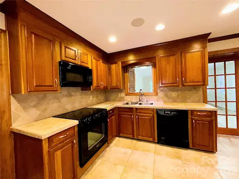 Kitchen has custom cabinetry