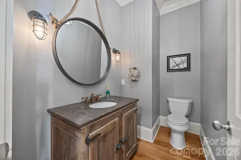 Convenient half bath for guests.