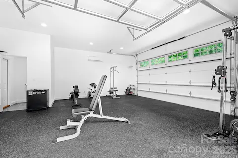 Detached garage can be used as gym, pool house or workshop.