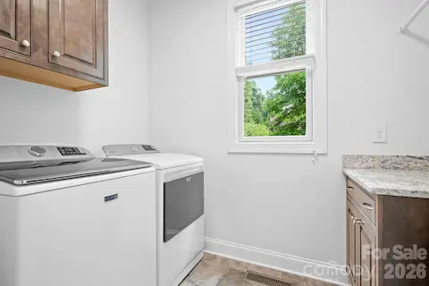 Laundry room with folding and hanging areas