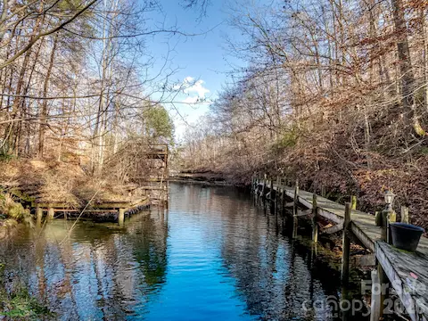 The illuminated boardwalk offers a convenient spot to dock your watercraft and a perfect place to enjoy the fresh country air.