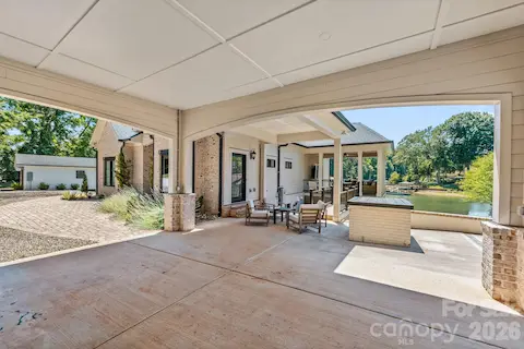 From Porte Cochere with sitting area and views