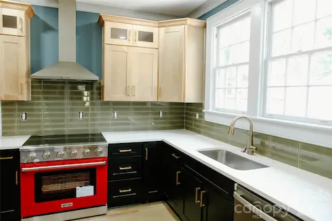 New tile, cabinets, appliances, countertops throughout