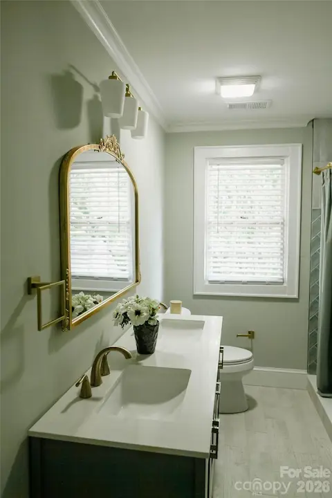New double sink vanity in first full bath and shower upstairs