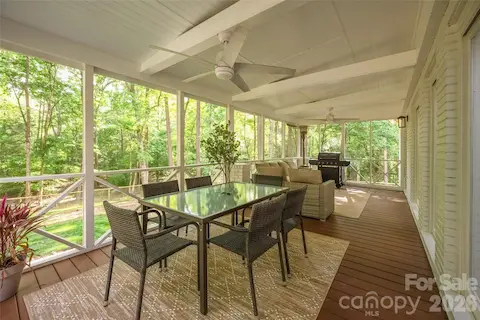 Screened in covered porch off of the dining room