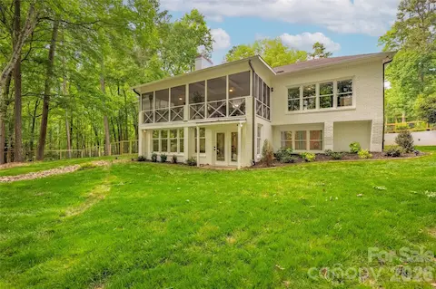 Back of home with walk out lower level