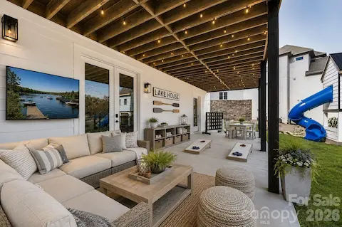 Virtually Enhanced photo of the covered patio/walkout full basement