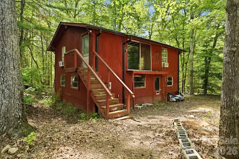 Two-story workshop with electricity, offering flexible space for a studio, workshop, or potential second living area.
