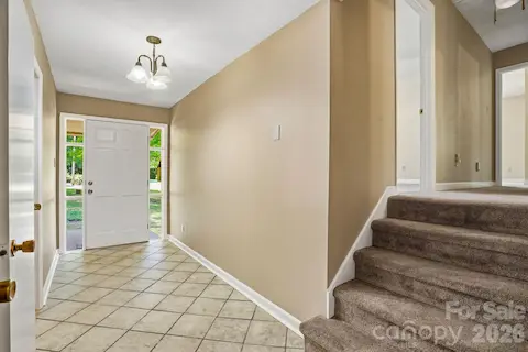 Welcoming foyer sets the tone for this charming, multi-level home.