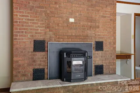 Pellet stove warms this living area with efficiency and charm.