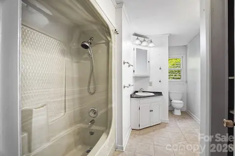 Guest bathroom with a functional layout, ready for your finishing touches.