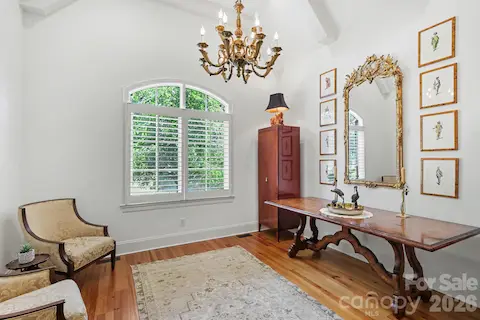 Main level office/ Bedroom two with full bath & closet