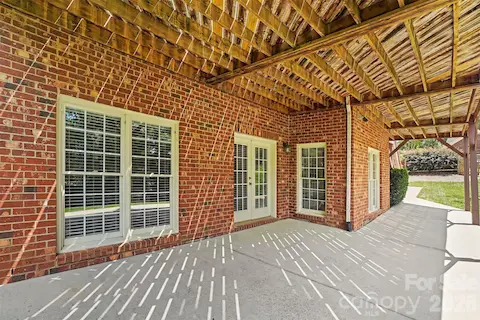 Lower covered patio, has access to basement.