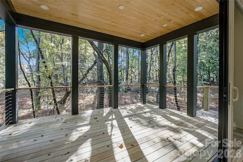 Representative photo of a completed home with the same floorplan. Photos do not reflect the exact finishes. 4003 Sage Cliff will have a screened porch with stamped concrete and gas fireplace.
