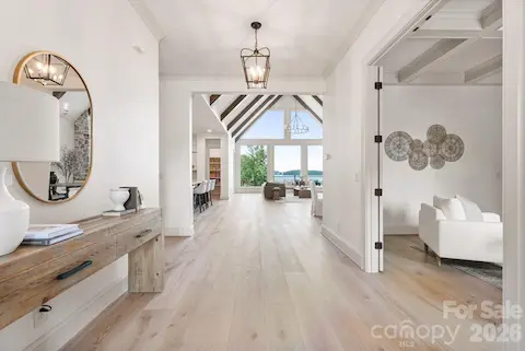 White oak floors and lake views greet you as you enter.