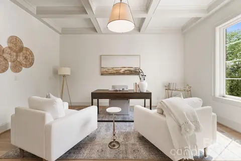 Main level study with French doors and accent ceiling