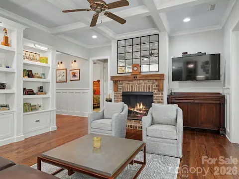Large great room open to sunroom and kitchen
