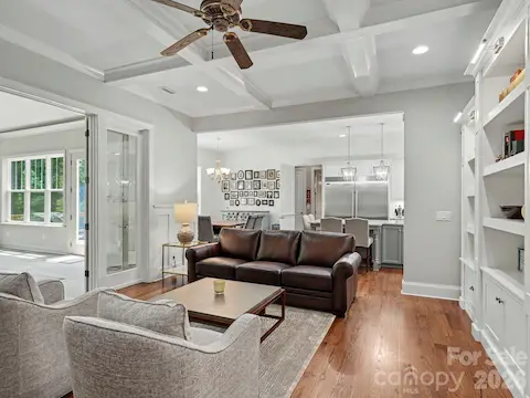 Large great room open to sunroom and kitchen