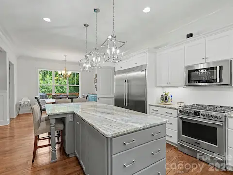 Kitchen open to breakfast area
