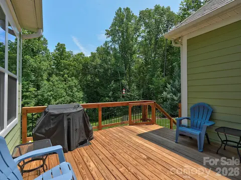 Private deck overlooking huge fenced backyard and woods