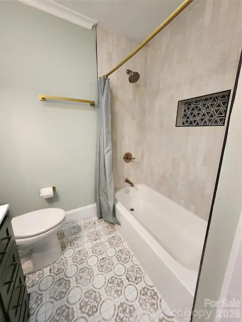 second full bathroom upstairs with bathtub shower combo