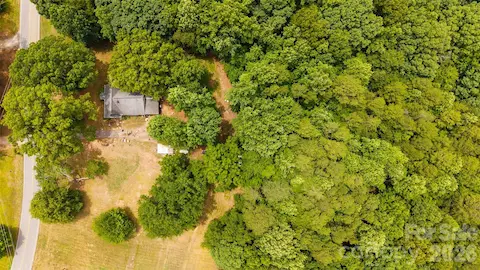 1940s house with shed on property