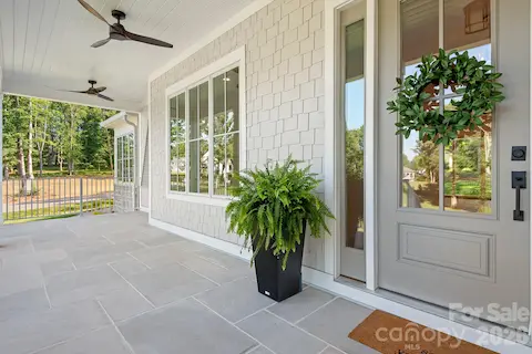 Great Limestone front porch with fans
