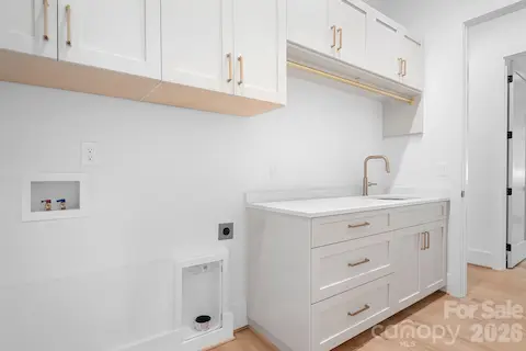 Laundry connected to Primary Suite