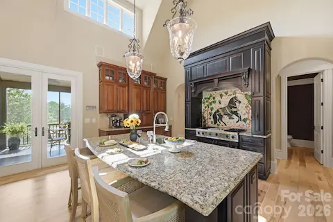 Viking gas cooktop with mosaic tile backsplash
