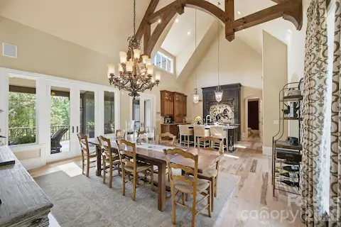 French doors and windows overlooking deck and screened in porch