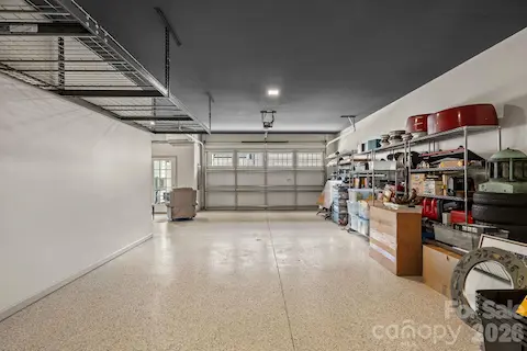 Basement Level Temp Controlled Garage, Epoxy and Elevator