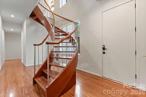 Ground-floor walk-out level with direct pool access and guest bedrooms