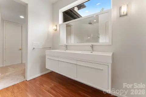 Full ground-floor guest suite with private entrance, pool access, and en-suite bathroom