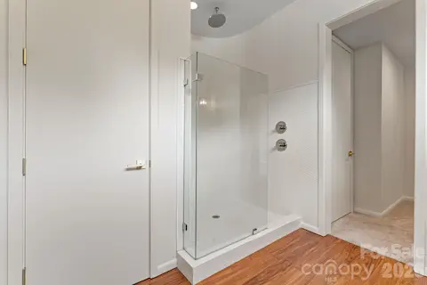 Lower-level guest suite with private walkout, spa bath, and independent access — ideal for multi-generational living